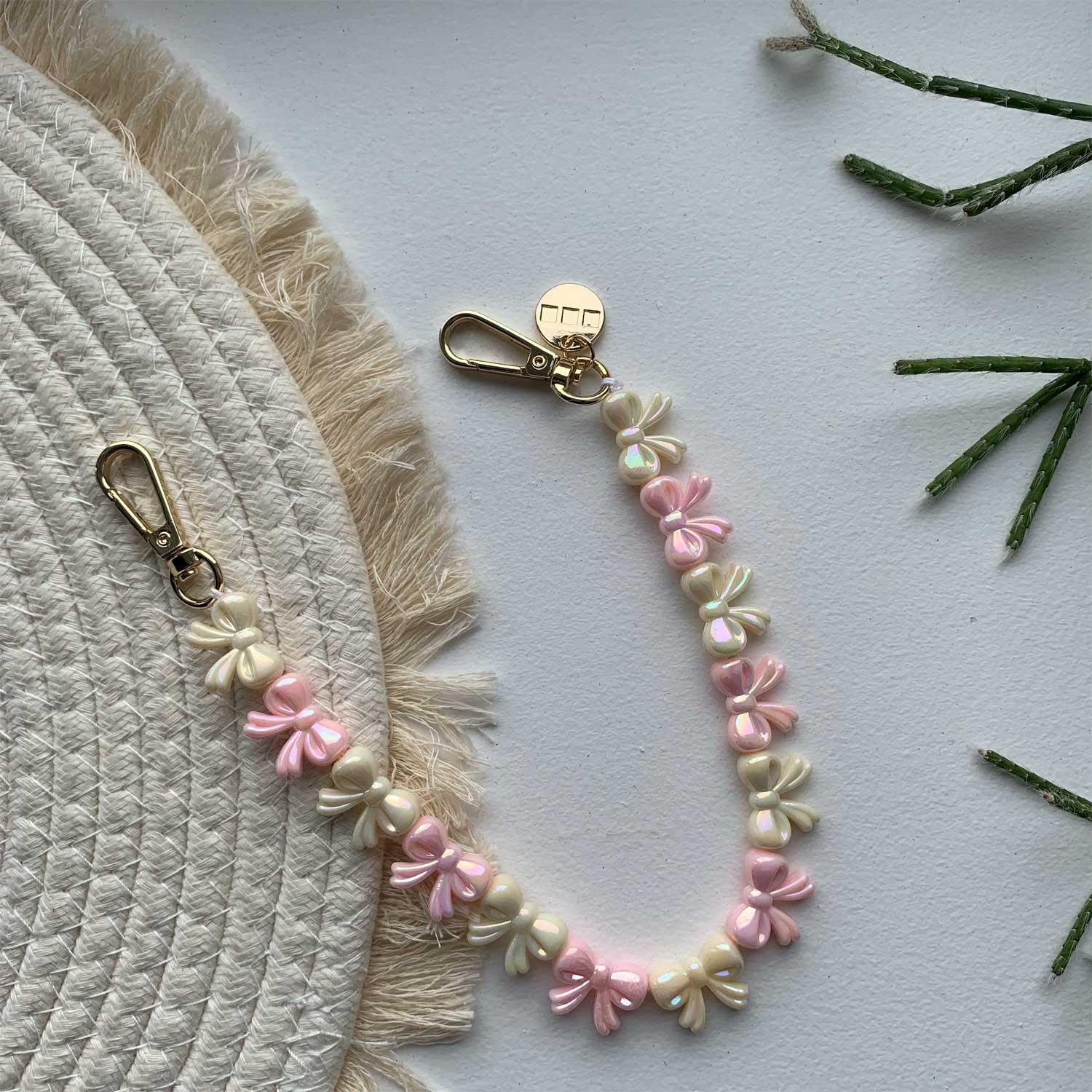Handykette Bow - rosa-weiß - gold